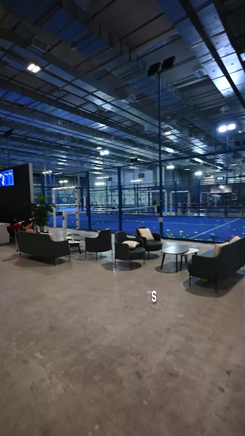 Lounge and front desk of an indoor padel club
